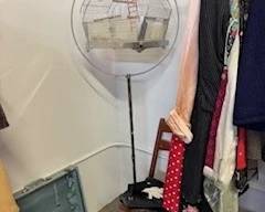 antique circular bird cage and holder