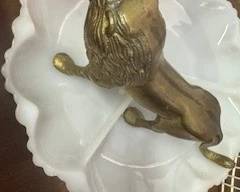 brass lion milk glass