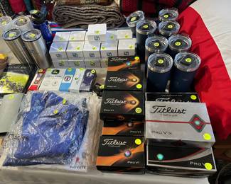 New Shirts and golf balls. New promotional items, post it notes, Drinking glasses, Shirts and pen sets.