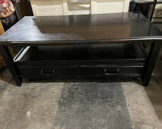 Coffee table with 2 drawers and shelf.