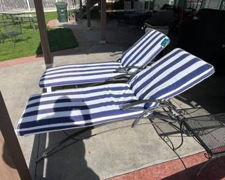 2 Home Crest lounge chairs.