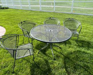 Wrought Iron table and 4 chairs.