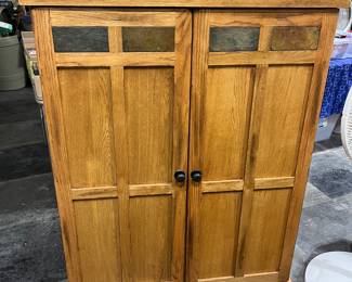 Large storage cabinet. Great for storing CDs, DVDs, Video games or VHS tapes. Heavy and well built.