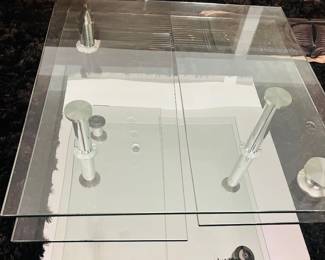 Modani Fuji rotating glass coffee table.