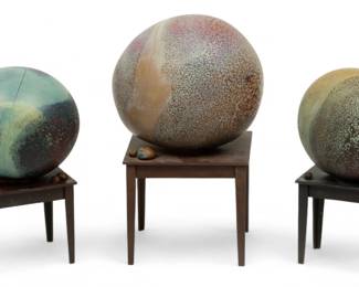 Lot 76 | Jack Schmidt (Toledo, Ohio, B. 1945) Glass in Volcanic Colors Three "Stones" on Metal Tables