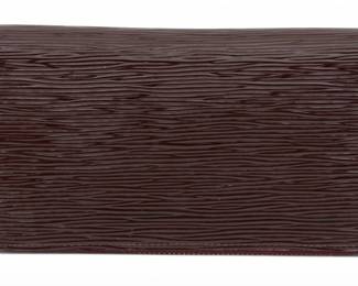 Lot 37 | Louis Vuitton (French) Zippy Wallet, Prune Epi Leather, Ca. 2010 H 3" W 8" Depth 1"