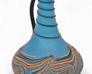 Lot 90 | Bill Poceta (American, Michigan, 20th/21st C.) Blown Glass Blue Swirl Ewer H 9" Dia. 6"