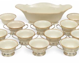 Lot 53 | Lenox (American) Gilded Porcelain Bouillon Soup Bowls with Sterling Silver Frames H 2" Dia. 4.3" 23 PCS