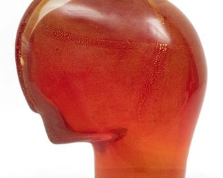 Lot 80 | Ursula Huber (Italian, B. 1952) Blown Amber Glass with Gold Leaf Sculpture, 2004, 'EGO Head' H 10" W 5" Depth 9.3"