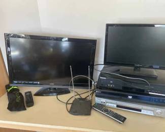 Two TVs And Three DVD Players