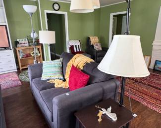 Love seat. Floor lamp. Table with lamp