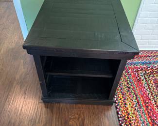 End table. Rug.