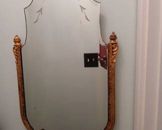 Antique small gold trim mirror