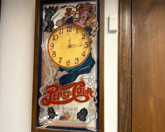 . . . Pepsi clock mirror