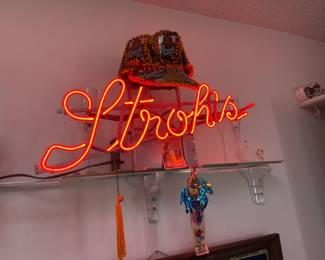 . . . Stroh's neon sign and Stroh's folk-art hat