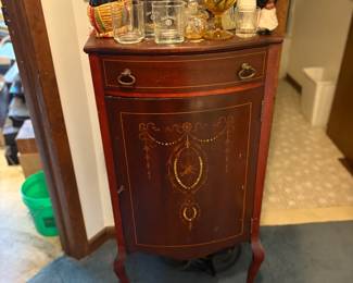 . . . antique record or other cabinet