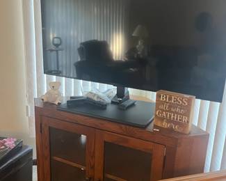 . . . large flatscreen and TV stand