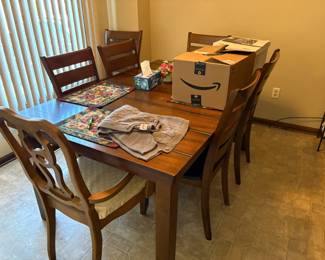 . . . walnut-toned table and chairs