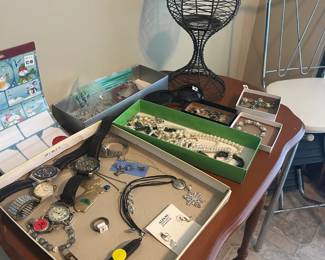 . . . some costume jewelry and nice watches