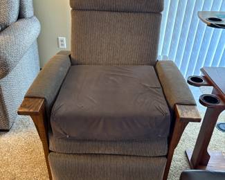 . . . grey recliner and cushion