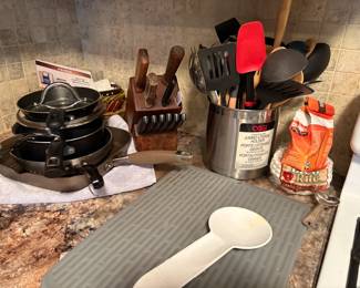 . . . knife set, pot, pans, and utensils