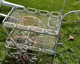 White metal mesh rolling cart