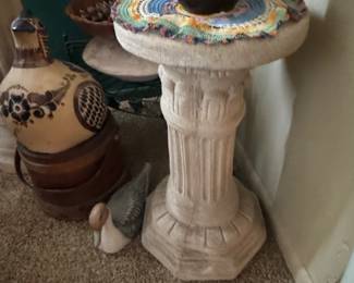 Lots of stands throughout the house and Mexican Clay bird