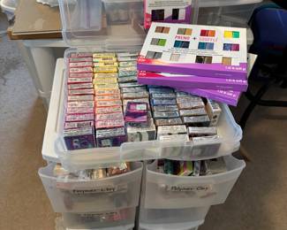 hundreds of polymer clay unused - this is just a sample - lots of stacking rolling storage bins sold separately