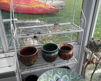 white metal etagere - planters - glass plant water balls