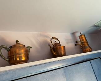 Lot of copper, brass and metal tea pots
