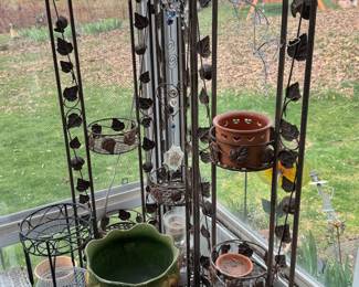 metal 3 panel planter screen with other planters and metal stands