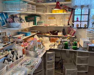 Art supply room still with stencils, paint supplies, jewelry supplies, tools & sewing supplies