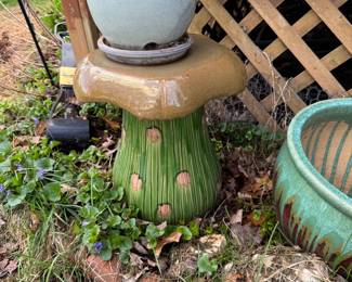 Ceramic planters and stools throughout the patio & backyard