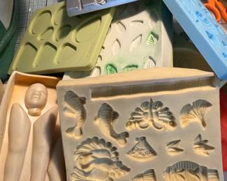 lots of silicone, plastic and metal molds for polymer clay art