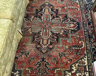 Heriz Serapi, 9’3” x 13’ 4”; raised
wool texture, edges are intact, some fading and areas of wear, overall good condition.