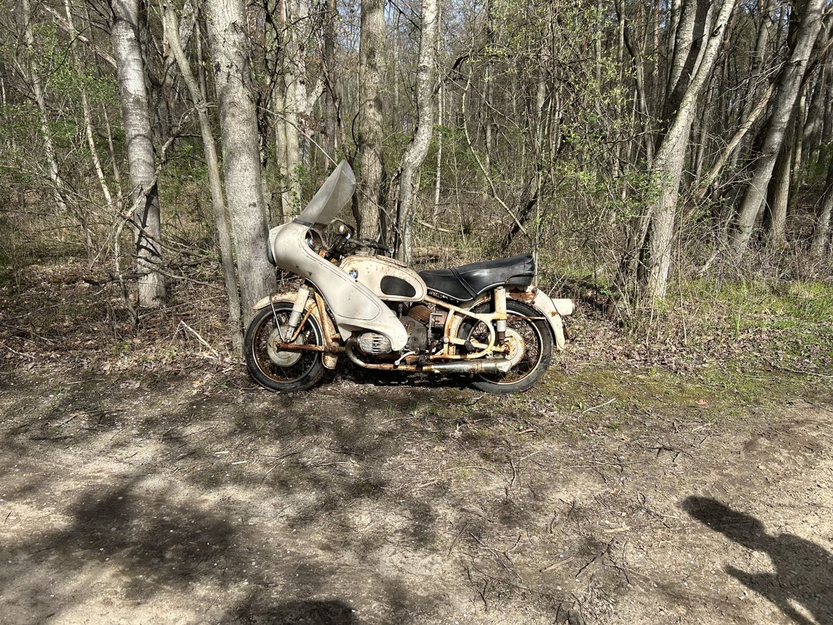 1966 R60 BMW (has sidecar as well)15,000 miles on it. It ran when it was put in shed years and years ago. But, yes, needs restoration.