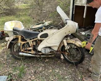 1966 R60 BMW (has sidecar as well) 15,000 miles on it. Ran when it was put away years and years ago.