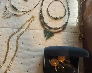 costume jewelry brooches, earrings, necklaces, and bracelets