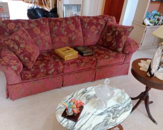 very nice and clean sofa with marble top coffee table and more