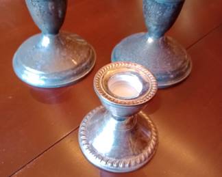 weighted sterling silver candleholders