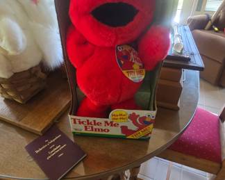 vintage tickle me Elmo in original box I remember when people were fighting at Walmart for this thing lol