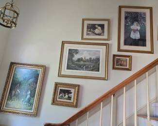 lots of paintings and framed prints