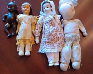 antique porcelain dolls one Bla__ Ameri____