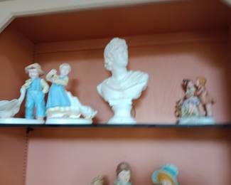 ceramic collectibles and a bust