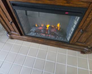 nice Amish fireplace tv console with remote and working