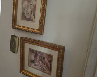 lots of paintings and framed prints