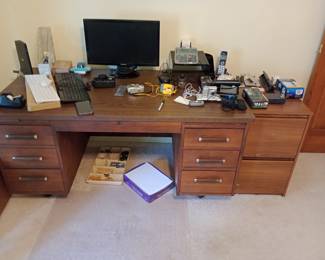 vintage office desk loaded with office supplies and more