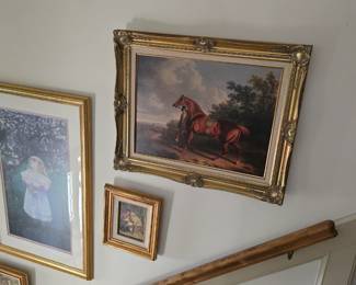 lots of paintings and framed prints