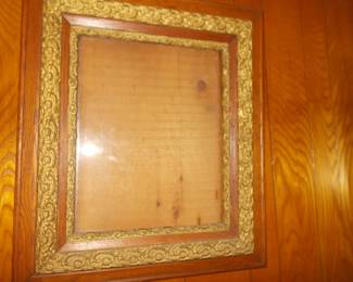 One of 2 large antique frames