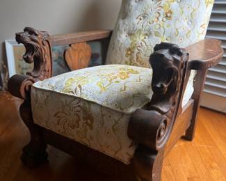 Amazing and super unique carved wood lion's head chair.
